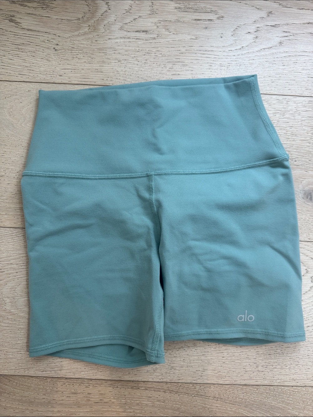 ALO Yoga High-Rise Bike Shorts in Seafoam Blue-Green